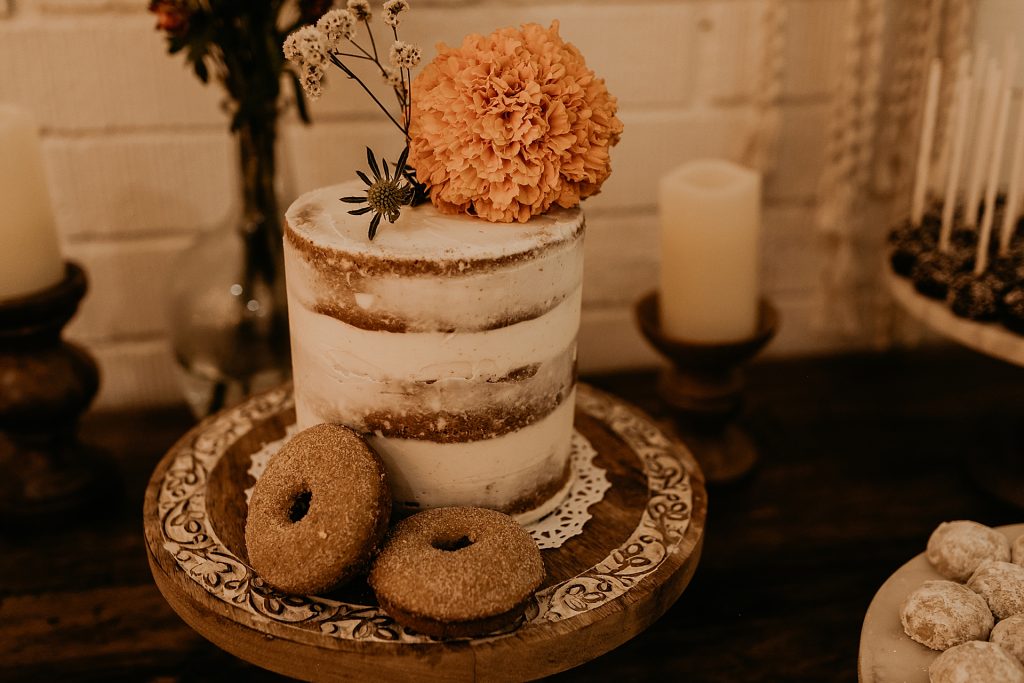 boho desert wedding dessert ideas, naked cake, donut wall at wedding